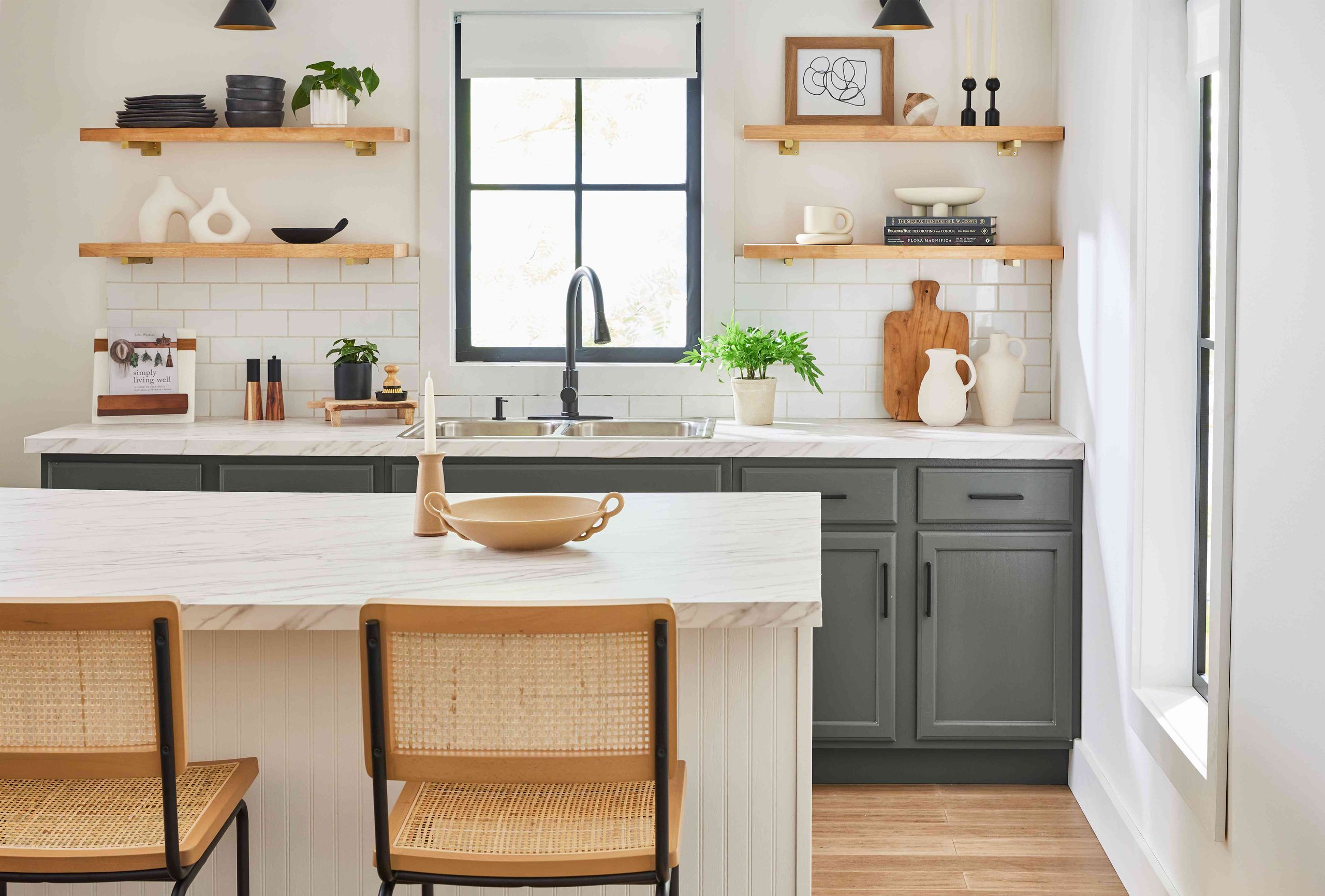 Minimalist organized kitchen counter with clear surfaces and functional storage